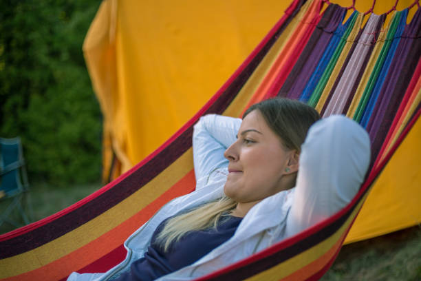 istock Smiling girl in a hammock 1489030095