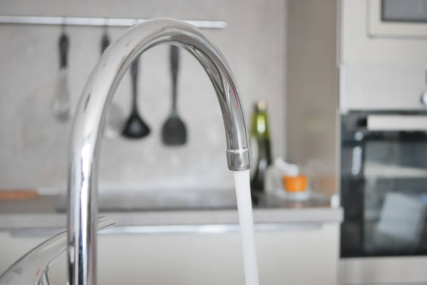 istock water pouring from a faucet tap slow motion 1489034797