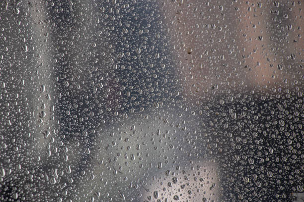 istock drops of water on a glass window after rain as a background 1489036110