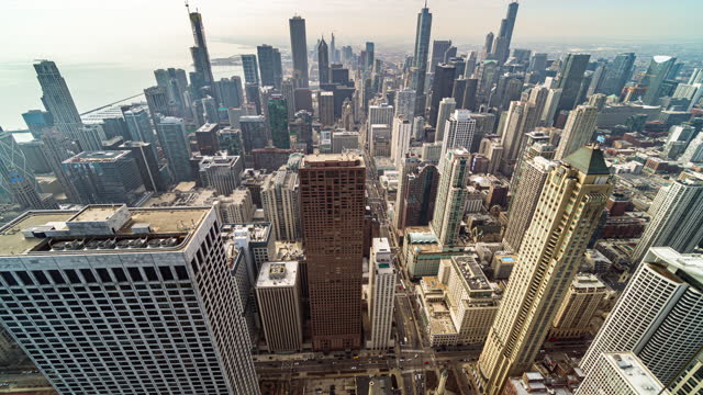 Time lapse aerial view of Chicago skyline city panorama with traffic car and transportation cityscape in Chicago, Illinois, United States, Landscape and Modern Architecture concept
