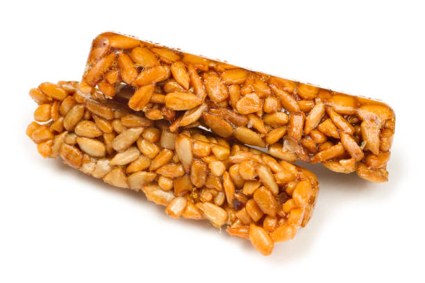 istock Sunflower seed kozinaki isolated on a white background. 1489043741