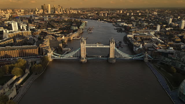 AERIAL Thames River and Tower Bridge at dusk