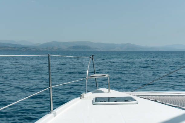 istock sailing catamaran front deck when cruising, amazing seascape, holiday on boat, travelling around the world 1489045607