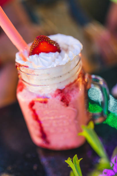istock strawberry milkshake in a beautiful glass in a cafe 1489048670