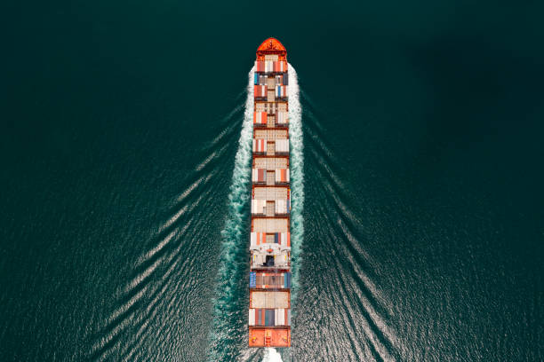 istock Container ship full speed sailing in deep sea for transporting cargo logistic import and export goods internationally around the world, including Asia Pacific and Europe, business and industry delivery service transportation concept,Aerial top view 1489050188