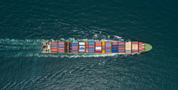 istock container cargo ship sailing full speed in pacific ocean to transport goods import export internationally or worldwide as business and industrial transport and marine services open sea aerial top view from drone 1489050218