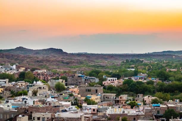 istock city house construction with mountain background and bright sunset sky at evening 1489050915
