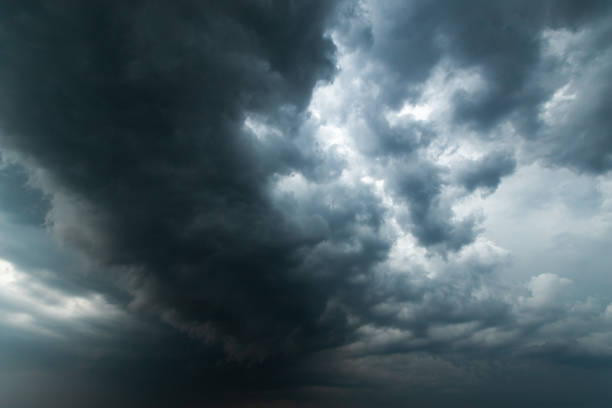 istock Storm clouds with the rain. Nature Environment Dark huge cloud sky black stormy cloud 1489053793
