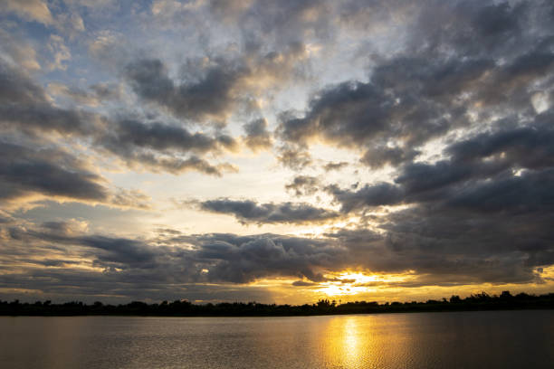 istock sun rise and sun set sky with cloud on a cloudy day. 1489053844