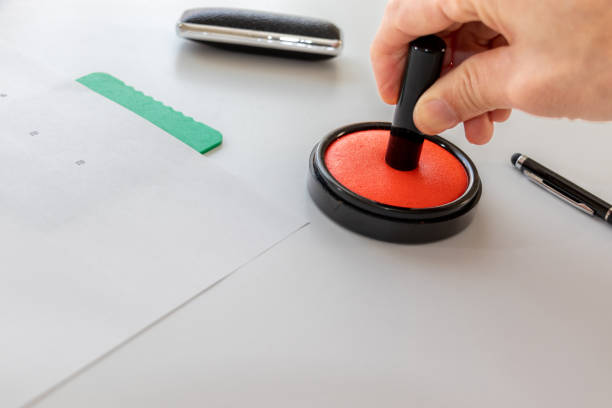 istock Japanese seal pressed against a red ink pad 1489057305