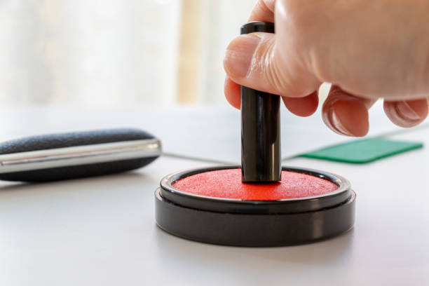 istock Japanese seal pressed against a red ink pad 1489057309