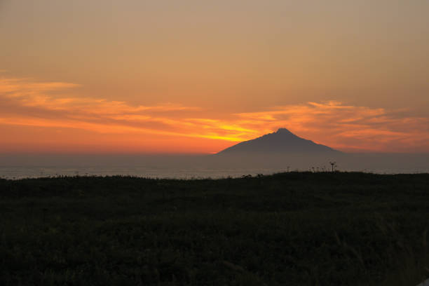 istock beautiful sunset and mountain shadow 1489057897