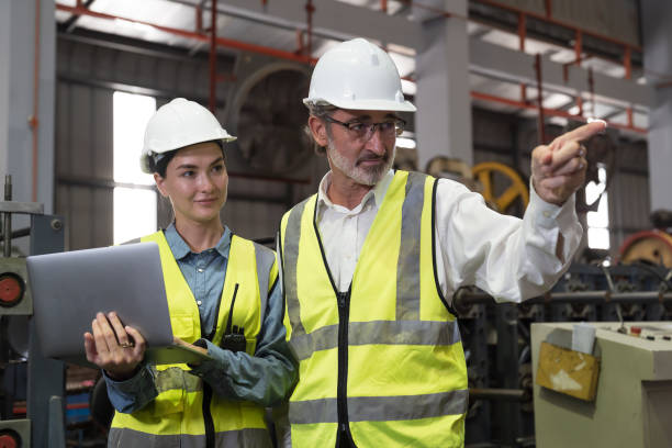 istock Group of engineer workers checking, repair and maintenance conveyor belt machine at manufacturing production lines in factory during manufacturing process 1489060431