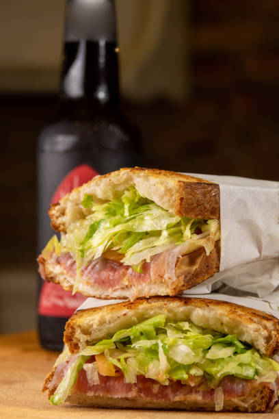 istock Sandwich on the wooden table with bottled beer 1489061192