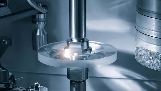 Lens manufacturing in modern laboratory.