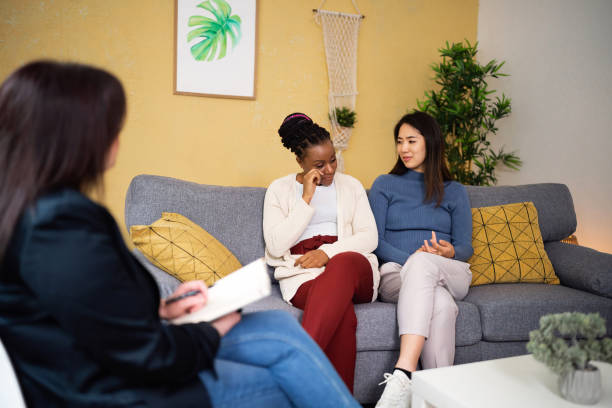 istock Woman crying during couple therapy with her girlfriend 1489071775
