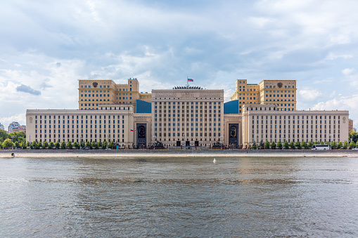View of the Ministry of Defence of Russian Federation, and Moscow river embakmenTranslation of the inscription on the facade - Ministry of Defense of the Russian Federation