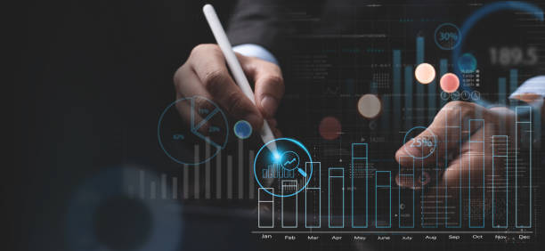istock Business data analysis, market research concept. Businessman using tablet with financial graph growth chart, analysing business data and marketing research, financial report. Business, finance and investment 1489072235