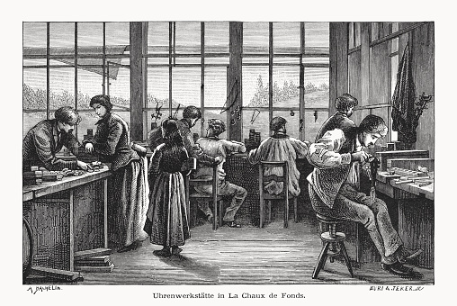 A watch workshop in La Chaux-de-Fonds, Switzerland. Nostalgic scene from the past. The prosperity of La Chaux-de-Fonds is mainly related to the watch industry and is still the most important location in the so-called Watch Valley. Wood engraving after a drawing by Auguste Bachelin (Swiss painter, 1830 - 1890), published in 1877.