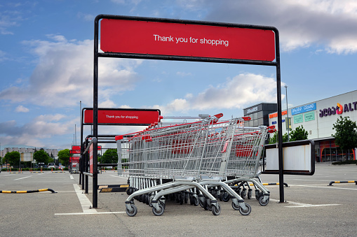 Big shopping cart with many products.