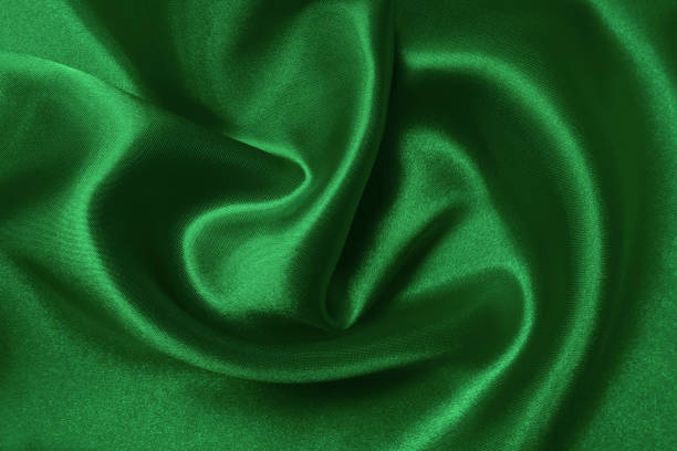 istock Green emerald fabric texture background, detail of silk or linen pattern. 1489080807
