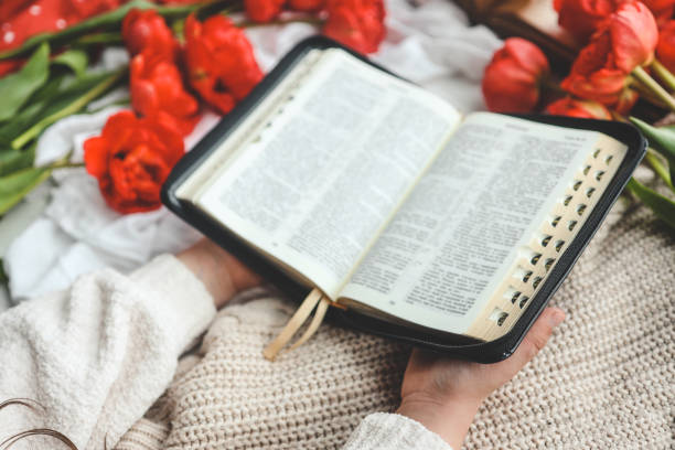 istock Open bible close-up in hands 1489082827