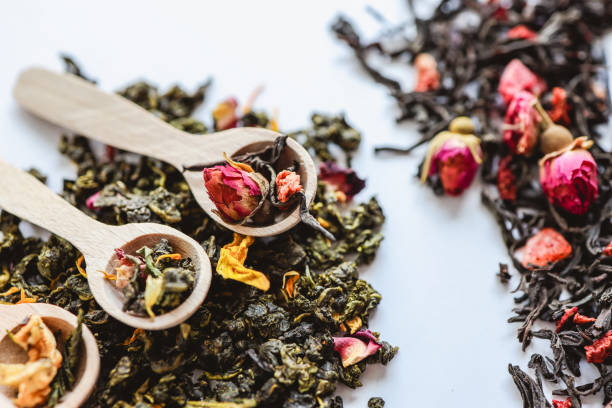 istock Herbal tea close-up in wooden spoons 1489082974