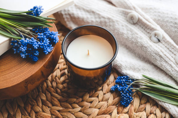istock Candle and flowers in home atmospheric interior 1489084384
