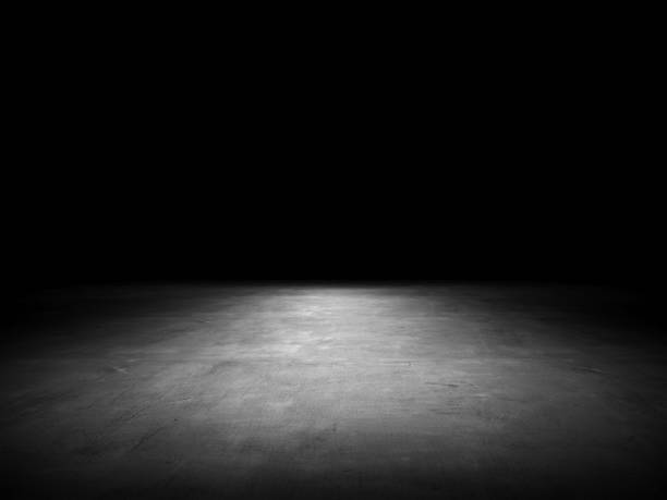 istock High resolution for background and design art work. Black background with spotlight to stone ground. 3D rendering. 1489084837