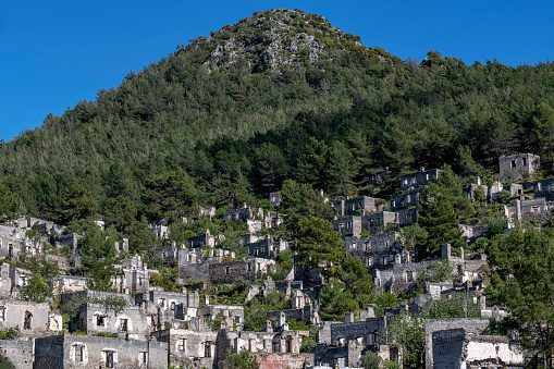 Kayakoy (Levissi Village), which was abandoned by the Greeks during the population exchange long ago.  Kayakoy (Kayaköy) is located within the borders of Fethiye, a district of Mugla, Turkey.
