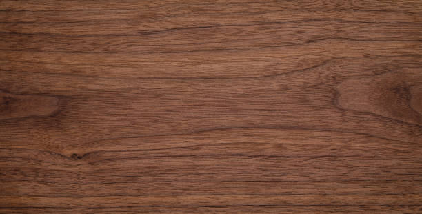 Walnut natural texture background. Extra long black walnut wood plank texture background.Wood texture background.