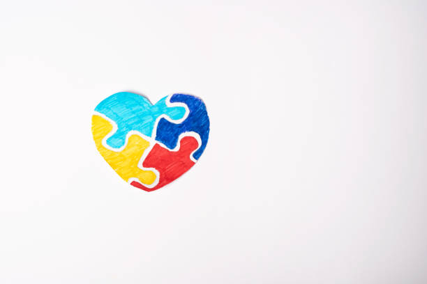 istock Colorful puzzle heart on a white background 1489096929