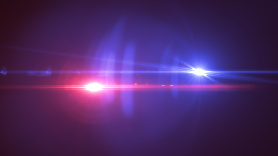 Police light flares. Beautiful glowing streaks on dark background. Perfect for topics like police, news, crime, entertainment, tv, storytelling.