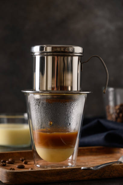 istock Traditional method of making vietnamese coffee with condensed milk. 1489106283