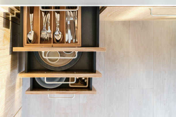 istock Kitchen drawers with stainless steel cutlery and dish 1489110371