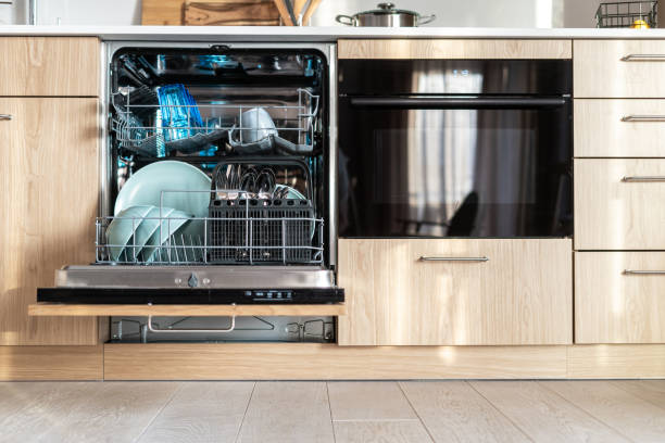istock Beige kitchen facade with modern integrated equipment 1489111707
