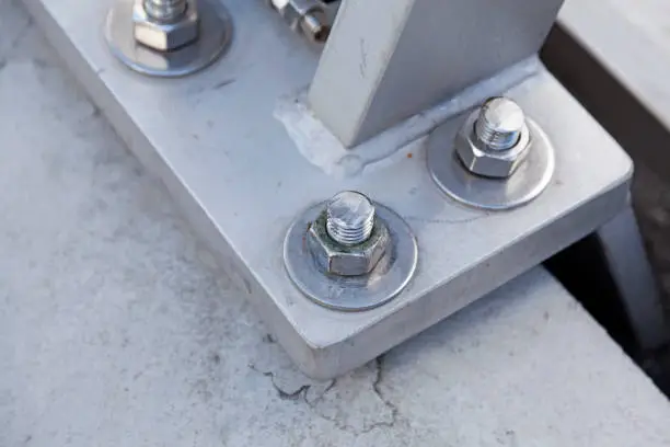 proper bolts that hold the bridge railing in place