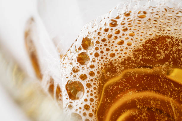 istock Beer foam and bubbles close-up 1489112511