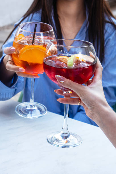 istock Beautiful women is drinking cocktail on the restaurant 1489115174