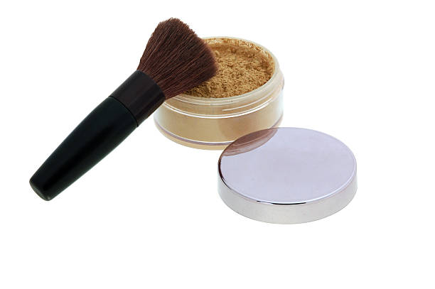 make-up powder, blush,  brushes stock photo