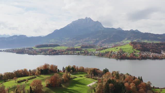 Drone aerial view of Geneva Lucerne lake with mountain and beautiful nature scenery landscape contour