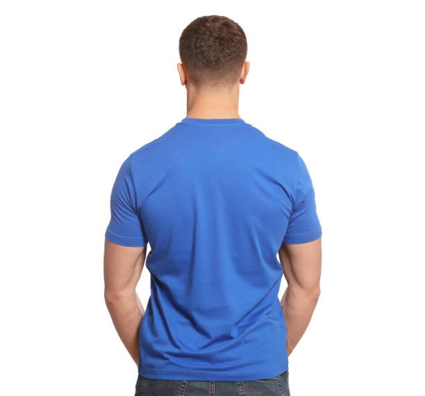 istock Man wearing blue t-shirt on white background, back view. Mockup for design 1489125962