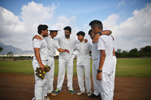 istock Young cricket team discussing game plan in huddle 1489129369
