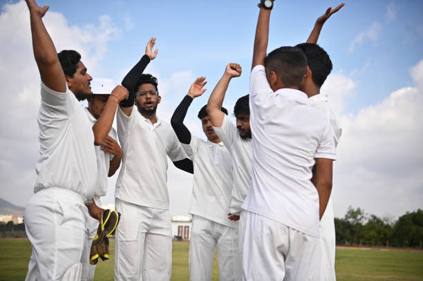 istock Young cricket team shouting the team slogan before entering the ground for match 1489129403