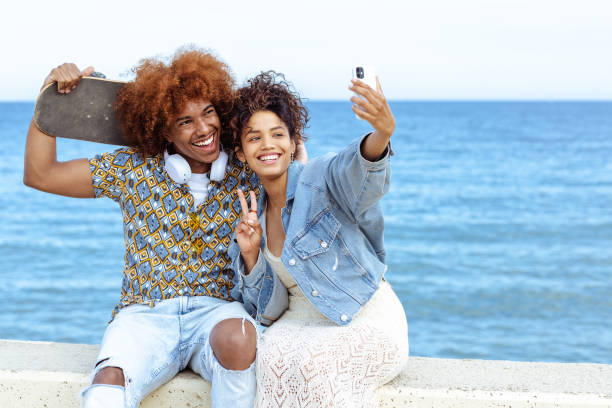 istock Young people taking selfie on the street 1489131621