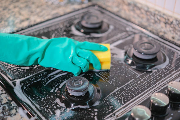 istock Woman is cleaning oven. 1489140727