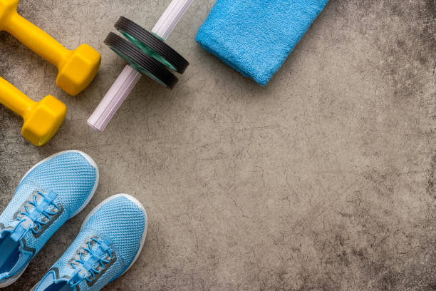 istock Sneakers and dumbbells for workout sport flatlay background 1489140977