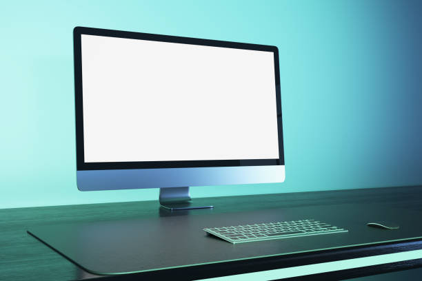 istock Contemporary blue workplace with empty white mock up computer monitor. Office concept. 3D Rendering. 1489142949