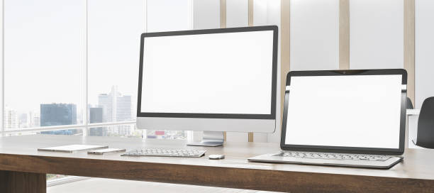 istock Modern designer office desk with empty white mock up computer screens, supplies and blurry interior with windows and city view background. 3D Rendering. 1489142966