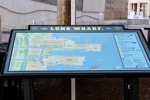 Boston, MA, USA, 9.11.21 - A sign with a map of Long wharf on it.